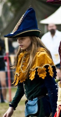 Gold Oakleaf Dagged Velvet Hood and Liripipe, lined in Regal Blue Velvet and trimmed Gold and Green Braid and Pewter Jewelled buttons centre front (With Kind Permission from The Abbey Museum)