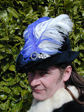 C14th Midnight Blue Velvet Cap, trimmed with Silver Braid and Feathers  C14th Midnight Blue Velvet Cap, trimmed with Silver Braid and Feathers
