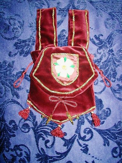 Burgundy velvet pouch embroidered with the White Rose of York emblem