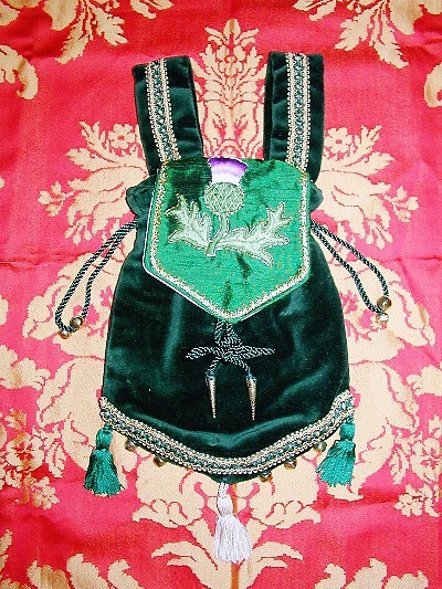 Dark green velvet pouch with silkwork thistle and goldwork on silk Dark green velvet pouch with silkwork thistle and goldwork on silk