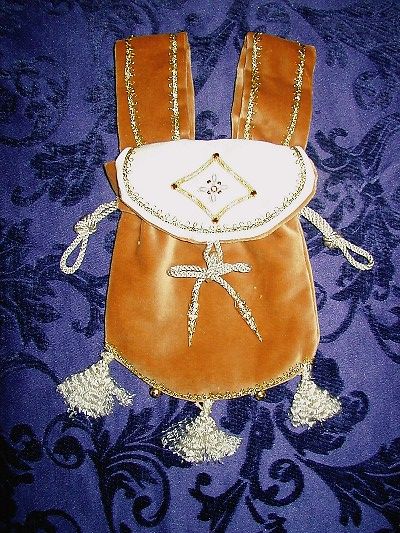 Tan velvet pouch with goldwork, pearls and jewels reproduced from a Mantle Tasseau