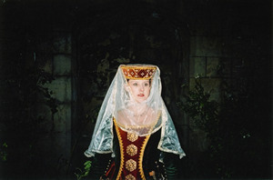 Rust velvet and goldwork torque with veil