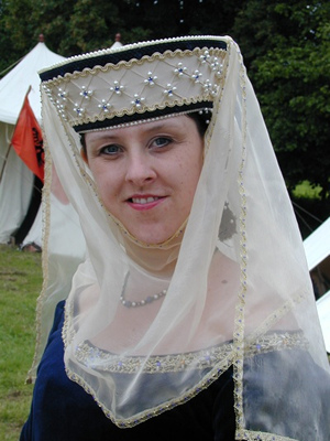 Cream silk torque encrusted with jewels and pearls