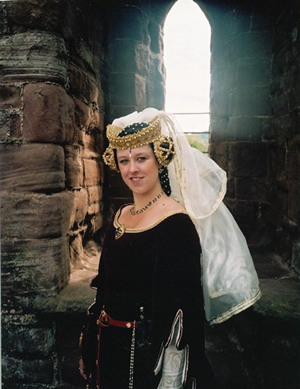 Gold tressour encrusted with red and blue jewels and pearls