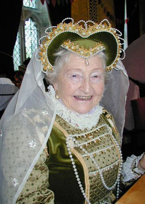A Sage Green Velvet Attifet Headdress, with Peridot Jewels and Pearls A Sage Green Velvet Attifet Headdress, with Peridot Jewels and Pearls